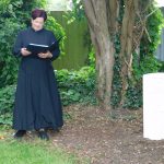 Photo of Reverend Katy Minshall taking the service