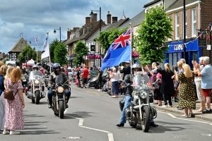 Photo taken of Royal British Legion Rider and crowd