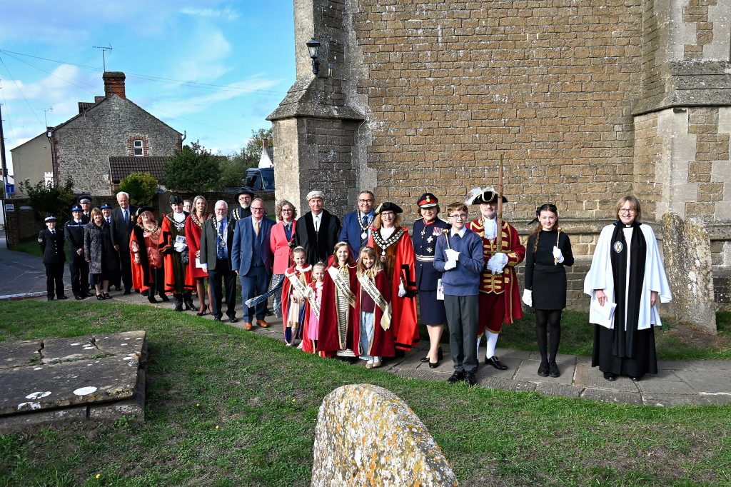 Group photo of the Civic Party at Mayor Councillor Fiona Holness Civic Service outside St Bartholomew and All Saints Church